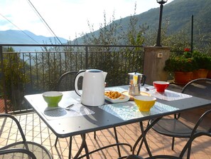 Table, Tableware, Plant, Furniture, Property, Sky, Chair, Outdoor Table, Outdoor Furniture, Interior Design