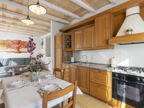 Cabinetry, Property, Furniture, Countertop, Table, Interior Design, Wood, Flooring, Floor, Kitchen