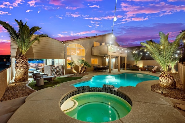 Welcome to Heritage Haven Villa, this premier property boasts an exquisite four-bedroom, three-bath sanctuary nestled in the vibrant community of Henderson, Nevada, just steps away from the renowned Heritage Sports Park.