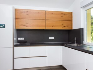 Cabinetry, Countertop, Kitchen Sink, Building, Sink, Kitchen Appliance, Tap, Kitchen Stove, Home Appliance, Kitchen