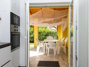 Furniture, Property, Chair, Table, Shade, Interior Design, Wood, Outdoor Table, Floor