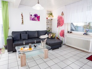 Couch, Property, Furniture, Decoration, Purple, Studio Couch, Lighting, Interior Design, Living Room, Floor
