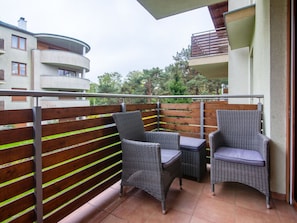 Furniture, Outdoor Furniture, Balcony, Apartment, Chair, Wood Stain, Hardwood, Shade, Houseplant, Porch