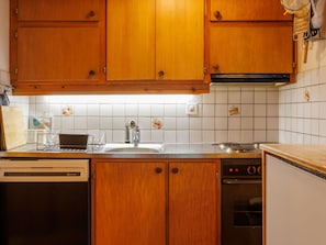 Kitchen, Countertop, Kitchen Appliance, Cabinetry, Major Appliance, Wood, Interior Design, Flooring, Kitchen Sink, Sink