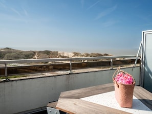 Sky, Horizon, Outdoor Furniture, Balcony, Chair, Shade, Fence, Handrail, Deck, Beach