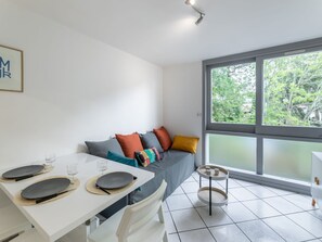 Plant, Furniture, Property, Window, Chair, Building, Wood, Lighting, Flowerpot, Architecture