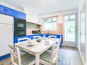 Cabinetry, Countertop, Table, Furniture, Tap, Window, Building, Sink, Kitchen, Chair