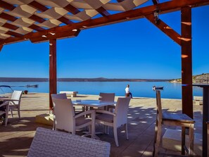 Water, Sky, Table, Furniture, Property, Blue, Azure, Chair, Shade, Wood