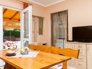 Table, Furniture, Plant, Wood, Chair, Building, Orange, Cabinetry, Interior Design, Shade