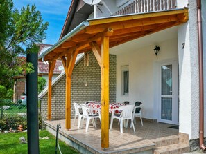 Plant, Property, Building, Porch, Shade, Chair, Table, Lighting, Door, Wood