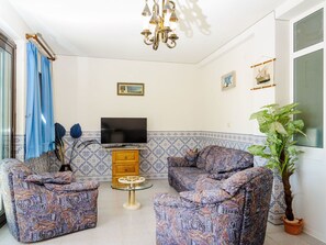 Eigentum, Möbel, Bilderrahmen, Blau, Couch, Pflanze, Interior Design, Zimmerpflanze, Holz, Wohnzimmer