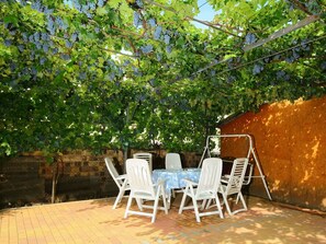 Furniture, Property, Chair, Leaf, Plant, Shade, Table, Outdoor Furniture, Wood, Leisure