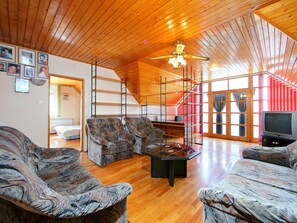 Picture Frame, Furniture, Couch, Property, Building, Television, Wood, Lighting, Interior Design, Flooring