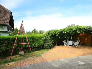 Sky, Plant, Cloud, Window, Building, House, Shade, Cottage, Leisure, Grass