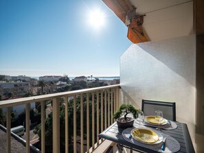 Sky, Table, Tableware, Building, Food, Dishware, Wood, Lighting, Plate, Serveware