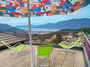 Sky, Property, Furniture, Mountain, Light, Nature, Green, Shade, Building, Outdoor Furniture