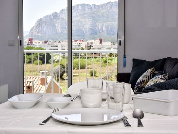 Tableware, Furniture, Property, Window, Table, Dishware, Building, Drinkware, Sky, Couch