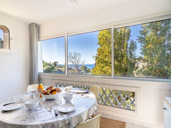 Property, Tableware, Window, Table, Shade, Food, Interior Design, Dishware, Floor, Sky