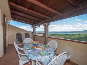 Sky, Furniture, Property, Table, Chair, Light, Cloud, Azure, Shade, Porch