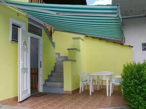 Property, Plant, Table, Building, Wood, Shade, Architecture, Chair, Line, Wall