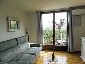 Furniture, Interior Design, Flooring, Floor, Room, Lighting, Apartment, Home, Couch, Living Room