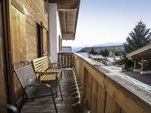 Sky, Property, Building, Wood, Tree, Interior Design, Shade, Chair, Hardwood, Armrest