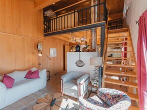 Furniture, Property, Picture Frame, Building, Comfort, Couch, Interior Design, Wood, Living Room, Bookcase