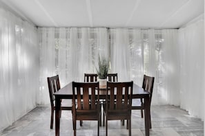 Our spacious dining area for six is perfect for gathering and dining, making every meal a delightful experience.