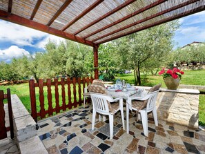 Plant, Property, Furniture, Table, Chair, Flowerpot, Outdoor Table, Tree, Sky, Porch
