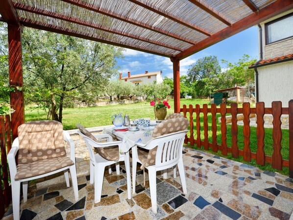 Plant, Furniture, Property, Table, Tree, Wood, Interior Design, Outdoor Table, Shade, Outdoor Furniture