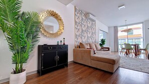 Step into luxury! Our lovely living room at Upscale 3 by Lovelystay offers stylish comfort, stunning balcony views, and the perfect space to relax. #apartment #shoppingcenter #funchal