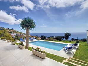 A charming Funchal villa with an inviting pool, sweeping ocean vistas #poolview #oceanview #panorama