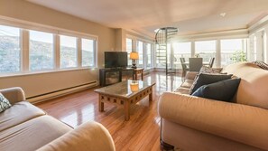This space offers both luxury and comfort with a cozy living room to curl up or relax with friends.