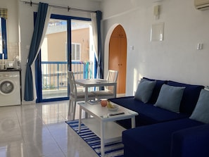 comfortable sofa that also pulls out to a double bed matress provided+bedding