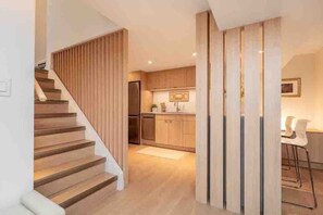 Eight stairs take you to the lower level suite that is all yours.