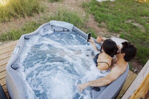 Bañera de hidromasaje al aire libre