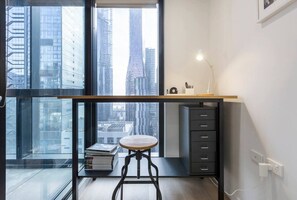 Additional luxuries include a dedicated workspace with a matte black desk, stool and some office essentials for those who need to work remote.
