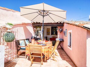 Property, Furniture, Sky, Table, Shade, Chair, Outdoor Furniture, Outdoor Table, Wood, Building