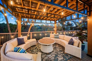 Round lounge chair overlooking the breathtaking view of the hill