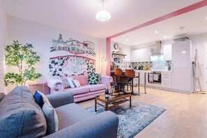 The open-plan living, kitchen and dining area benefit from a Smart TV with Netflix and plenty of space to sit down and relax in the evening.