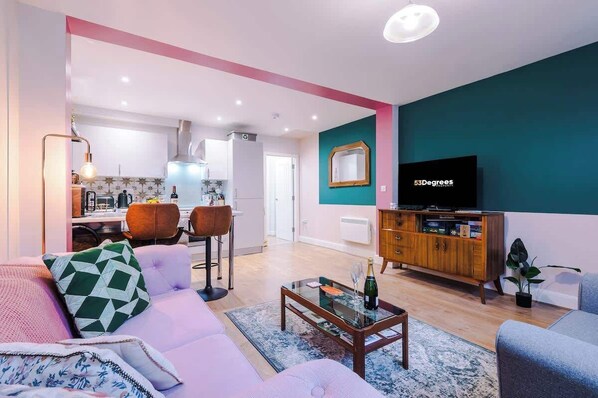 The open-plan living, kitchen and dining area benefit from a Smart TV with Netflix and plenty of space to sit down and relax in the evening.