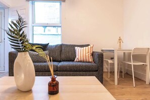The living room benefits from a double sofa bed, a dining area for 2, a Smart TV with Netflix and plenty of space to sit down and relax in the evenings.