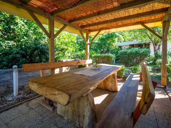 Table, Plant, Property, Furniture, Wood, Shade, Outdoor Furniture, Architecture, Outdoor Table, Tree