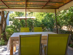Plant, Property, Building, Shade, Botany, Lighting, Tree, Architecture, Yellow, Biome