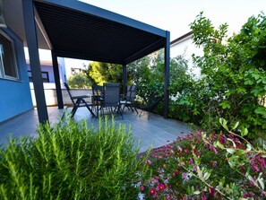 Plant, Flower, Furniture, Chair, Sky, Shade, Building, Window, Porch, Natural Landscape