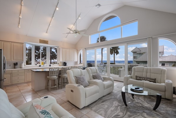 A Wave From It All - a SkyRun Anna Maria Property - Living Room - Enjoy high ceilings &amp; water views 