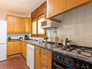 Cabinetry, Countertop, Building, Property, Kitchen Appliance, Kitchen Stove, Kitchen, Interior Design, Sink, Home Appliance