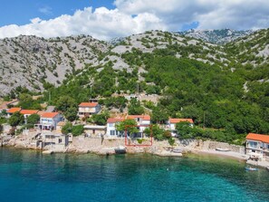 Water, Cloud, Sky, Water Resources, Mountain, Building, Azure, Coastal And Oceanic Landforms, Lake, Tree