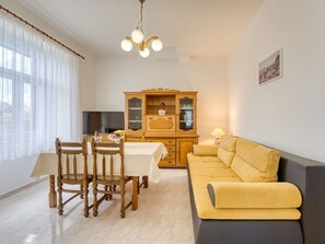 Furniture, Property, Table, Wood, Window, Couch, Picture Frame, Building, Floor, Living Room