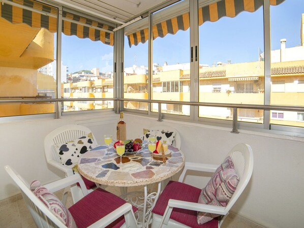 Table, Furniture, Property, Chair, Sky, Interior Design, Architecture, Building, Tableware, Shade